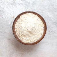 top view white flour inside plate on white background flour dust dough bake raw